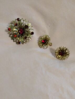 Gold Floral Brooch and Earrings Set with Red Rhinestones from the 1950's.